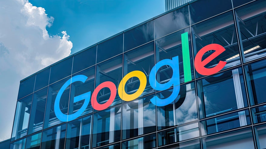 Building with google logo attached to the glass windows