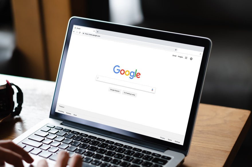Laptop screen showing Google search homepage