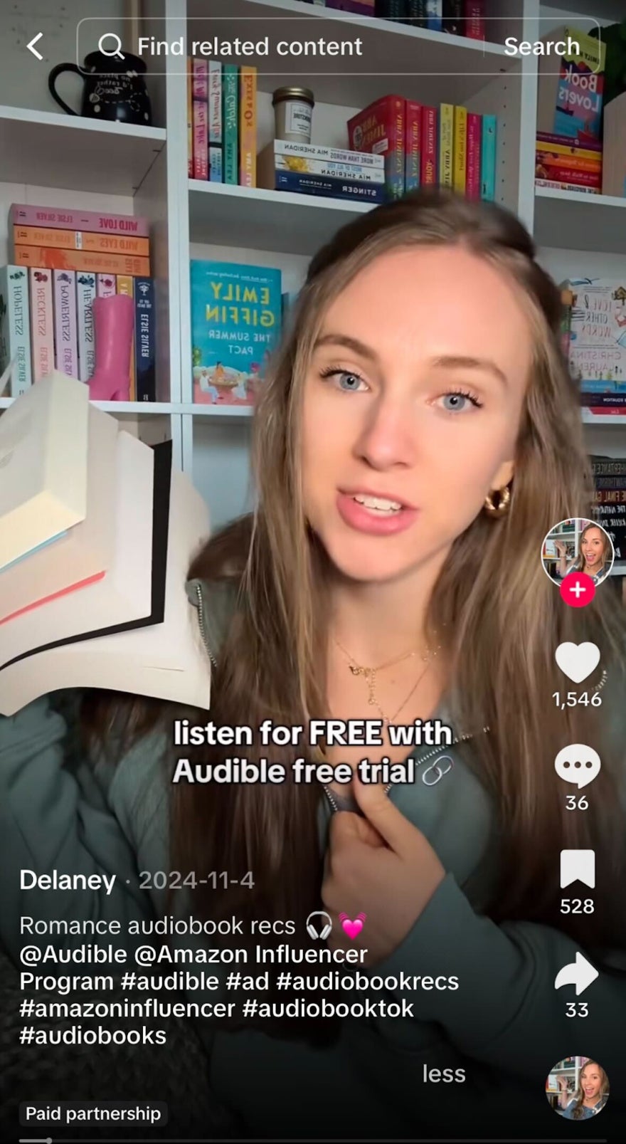 woman holding up books and talking in a TikTok ad for audible