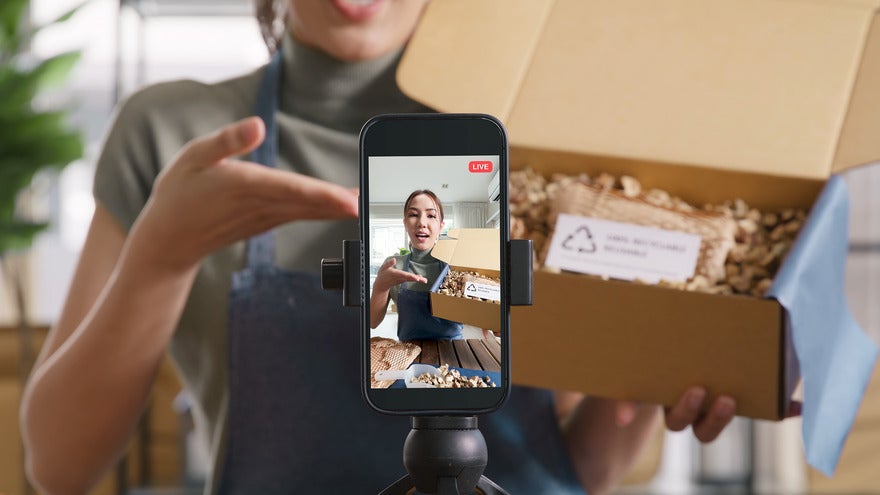Person live streaming a product showcase