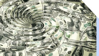 US dollars distorted by a water whirlpool