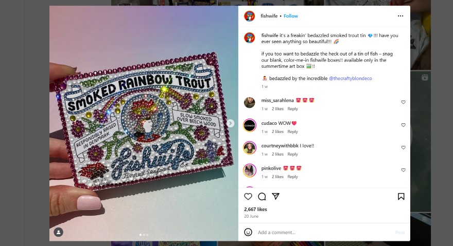 A screenshot of a social media post featuring a colorful background with text discussing smoked rainbow trout and promoting a product available during summer. The post includes user tags, emojis, and instructions for engagement.