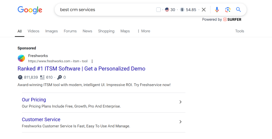 A Google search results page showing a "Sponsored" ad result for CRM software