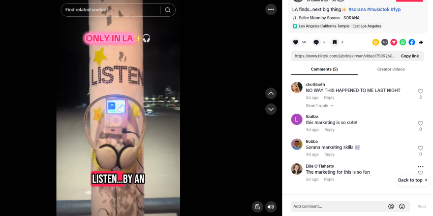 A TikTok screenshot of a colorful pole with a sign reading "ONLY IN LA" and headphones attached, promoting a unique listening experience at night.
